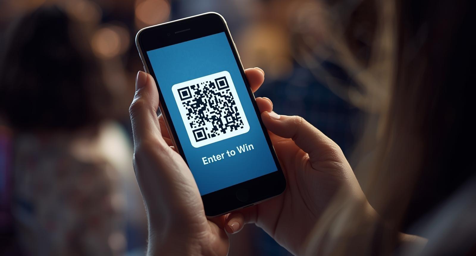 Person looking at the QR code on their phone